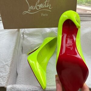 Brand new Christian Louboutin so Kate 100 patent leather pumps in neon. Size 7